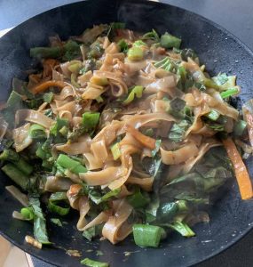 Pad kee mao drunken noodles in a pan