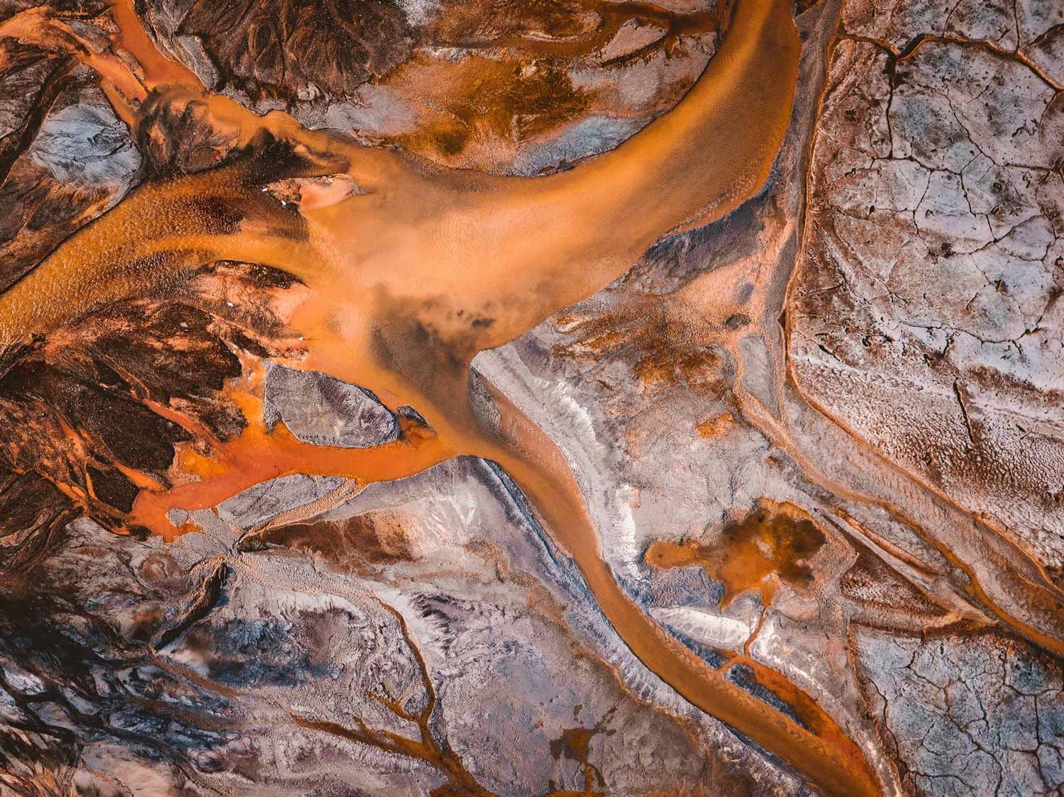 orange lake through the grey ground